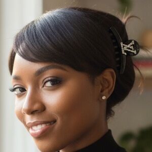 Luxury glossy black sparkling crystals interlocking "L. V small claw hair clip